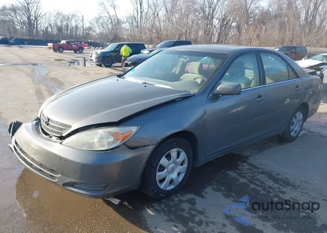 2003 Toyota Camry Le z USA, uszkodzony, nr VIN 4T1BE32K23U705725
